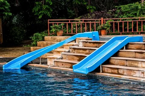 The water slide of pool Stock Photos