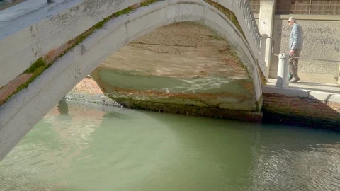 The water on the small canal with the small bridge Stock Footage 82209602