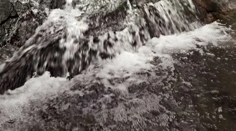 Water in small mountain river. Video FullHD Stock Footage 61754337