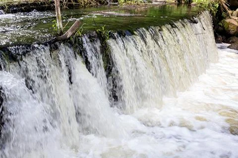 Water in a small waterfall in the forest Stock Photos