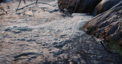 Water at Small Waterfall at River on Sunset Stock Footage 159098466