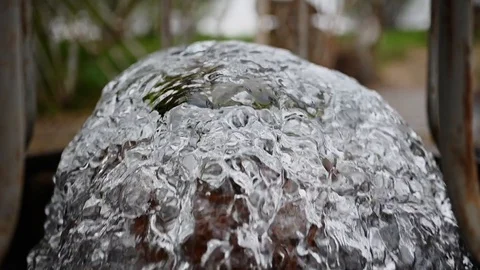 A water source gushes from an underground pipe in slow motion Stock Footage 130108465
