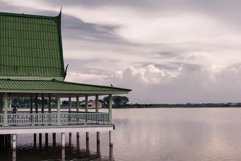 The water source at the park has a cloudy sky. Holiday evenings Stock Photos