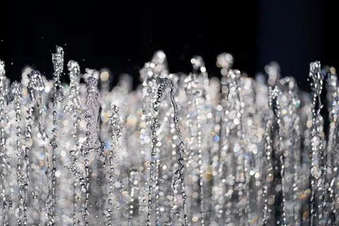 Water splash background. Drop pattern. Drop splash motion. Splash texture Stock Photos