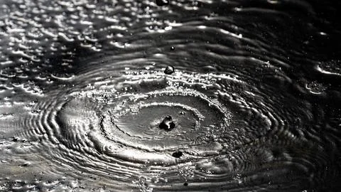 Water splash background. Drop pattern. Drop splash motion. Droplet background Stock Photos