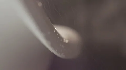 Water splash from bathtab and drops falling down from woman wrist on the floor Stock Footage 83181582