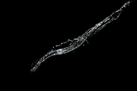 Water splash on black background Stock Photos