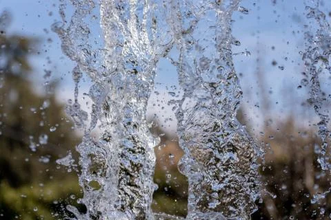 Water splash on blurred background Stock Photos