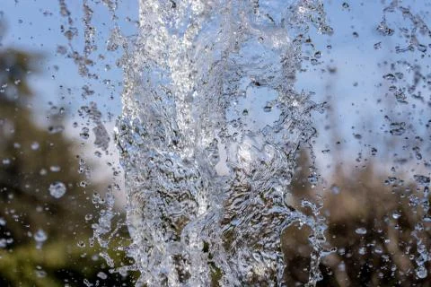 Water splash on blurred background Stock Photos