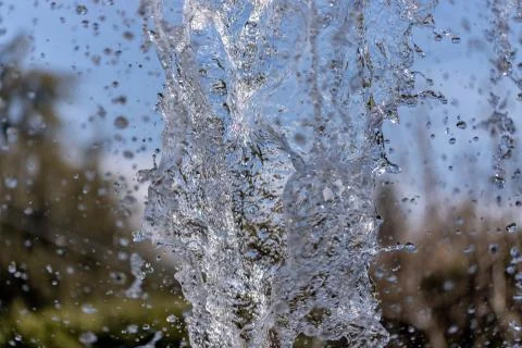 Water splash on blurred background Stock Photos