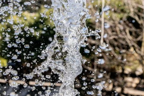 Water splash on blurred background Stock Photos