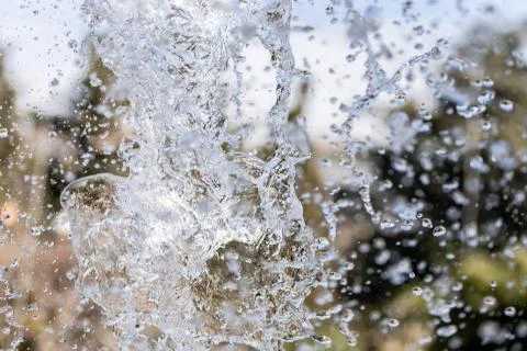 Water splash on blurred background Stock Photos