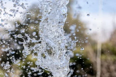 Water splash on blurred background Stock Photos