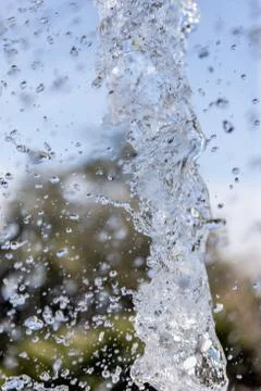 Water splash on blurred background Stock Photos