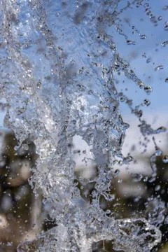 Water splash on blurred background Stock Photos