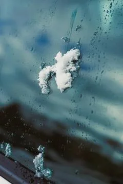 Water splash with bubbles and droplets on glass surface Stock-Fotos