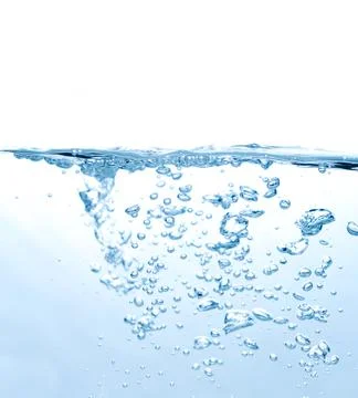 Water splash with bubbles  on the white background. Stock Photos