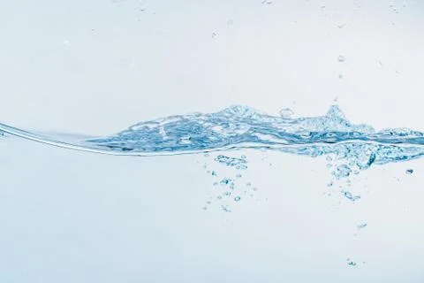 Water splash close up of splash of water forming shape isolated. Stock Photos