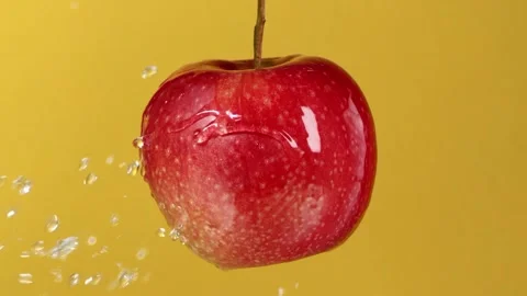 Water Splash on Fresh Apple Stock Footage 318409981