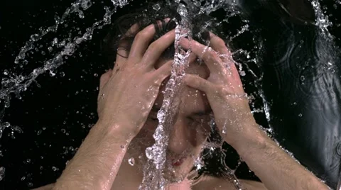Water splash on man's face, Slow Motion Stock Footage 10964175