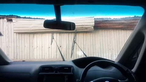 Water Splash from a Pressure Washer on the Driver's Windshield Side Stock Footage 155446985