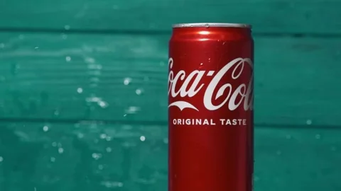 Water splash in a slow motion over classic Coca-Cola red can Stock Footage 243100574