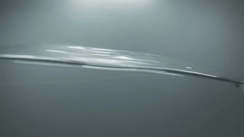 Water splash in slow motion on white background. Stock Footage 116881369