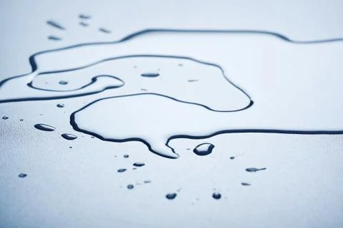 Water splash on table in font light Foto stock