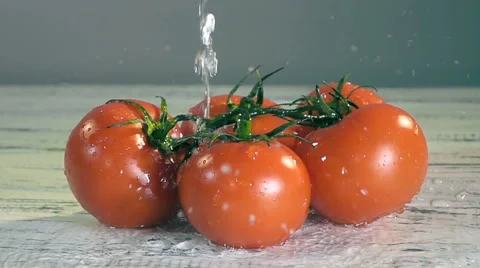 Water splash on tomato Video stock 59994120