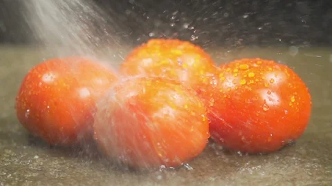 Water Splash on Tomato Stock Footage 130141698