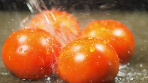 Water Splash on Tomato Stock Footage 130142601