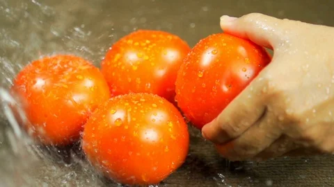 Water Splash on Tomato Stock Footage 130142609