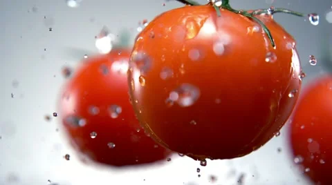 Water splash on tomato, Slow Motion Stock Footage