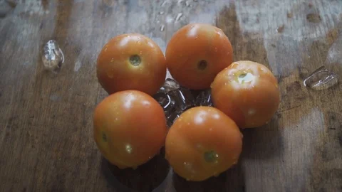 Water splash on tomatoes in slow motion. Stock Footage 97070744