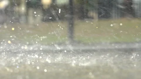 Water splashes against the asphalt Stock Footage 209117463