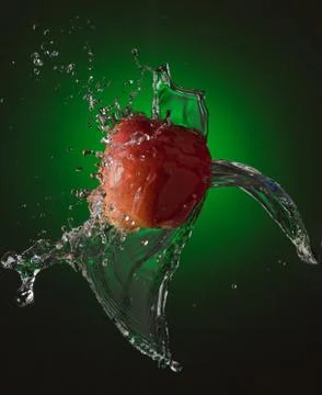 Water Splashes on Apple Stock Photos