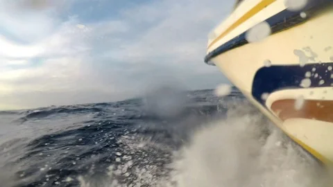 Water splashes onto the camera from a speeding speedboat in slow motion Stock Footage 93306735