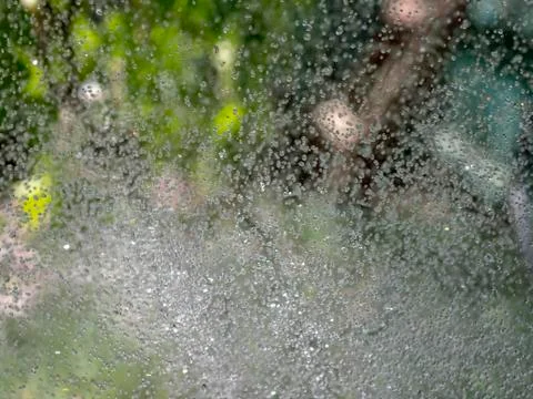 Water splashes on green background Stock Photos
