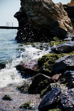 Water splashes. Shore. Stock Photos