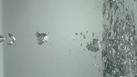 Water Splashes into Sideways Puddle Stock Footage 75920642