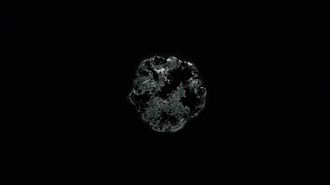 Water splashes in slow motion on a black background 4k Stock Footage 136038126