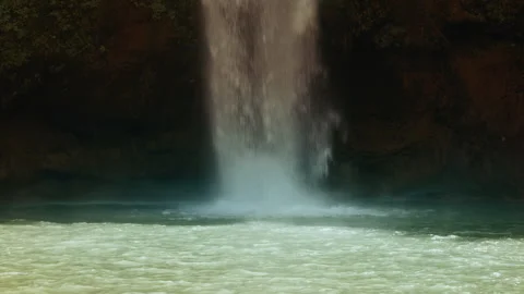 Water Splashing After A Fall From An High Cliff Stock Footage 314857749