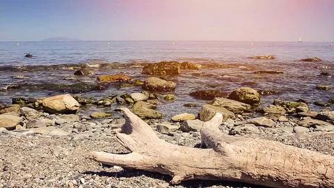 Water splashing against rocks Stock Footage 78560113