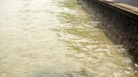 Water splashing off the coast. Wave on the surface of the water. Video stock 116557066