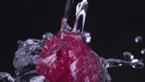 Water Splashing on Fresh raspberry Super Slow Motion at 1000fps Stock Footage 141068390