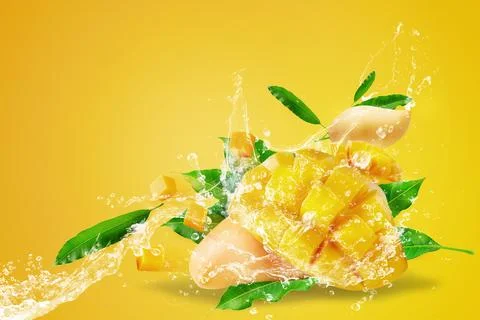 Water splashing on Fresh Sliced Mango fruit with mango cubes Isolated on ye.. Stock Photos