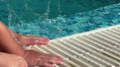 Water Splashing at the Poolside Stock Footage 336010590