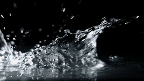 Water Splashing in Slow Motion Stockbeeldmateriaal 73717434
