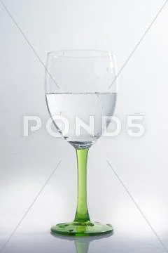 Water Splashing In A Wineglass