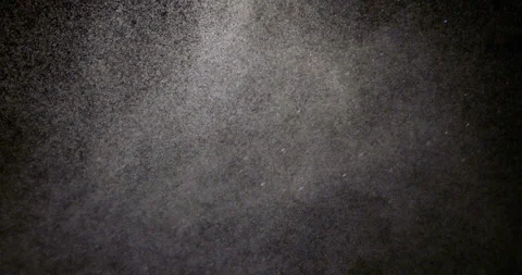 Water spray dust. Spraying mist effect of air gun isolated on black background Stock Footage